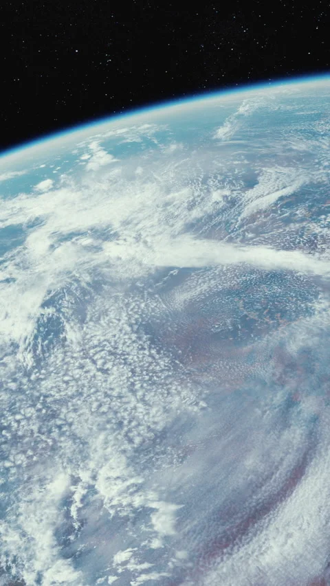 View of Earth from space showing clouds and blue ocean at daylight Stock Footage 341015932