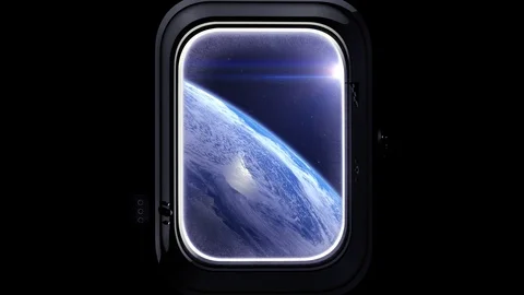 View of Earth through the window of the international space station. Space Stock Footage 74850978