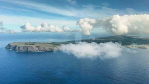 A view of Easter Island seen through the clouds from an airplane, November 20 Stock Footage 333951221