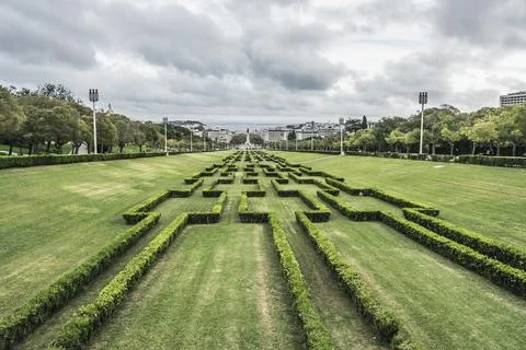 View of Eduardo VII park with labyrinth in Lisbon, Portugal on a cloudy day Stock Photos