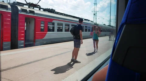 View From the Effluent From the Train Station. People go on the Platform Stock Footage 64765247