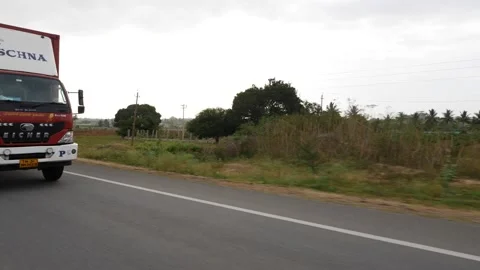 View of Eicher trucks running on Indian roads Stock Footage 156972620