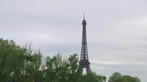 View of the Eiffel Tower against the backdrop of an evening cloudy sky in Paris. Stock Footage 308732487