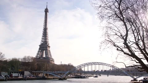View of the Eiffel tower an bridge across the Seine Stock Footage 182903392