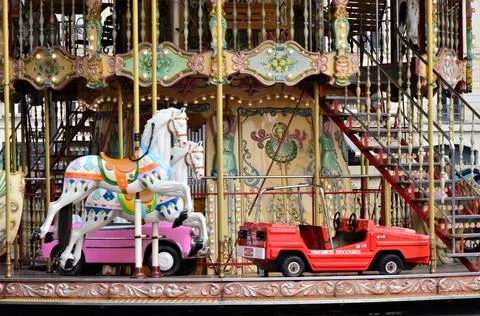 View of the Eiffel Tower with carousel beside, Paris, France Foto stock
