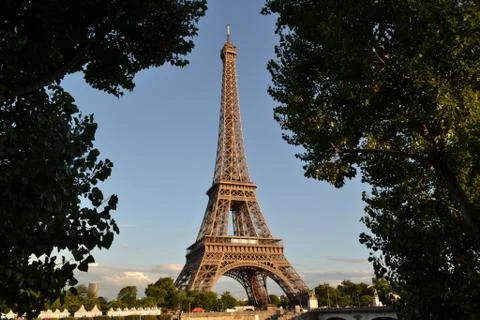 View to the Eiffel Tower from the opposite Seine riverbank. Stock Photos