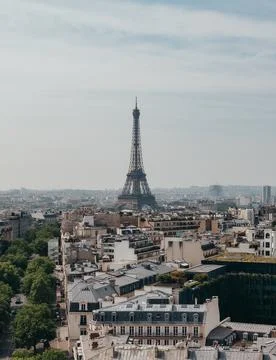 View of Eiffel Tower over rooftops of Paris from Arc de Triomphe. Fotos Stock