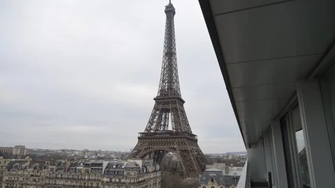 View of the Eiffel Tower in Paris, from a balcony. Slow pan down. Stock Footage 301855536