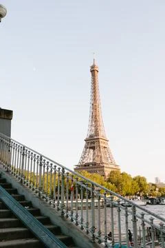 View of the Eiffel tower from Pont d'Iena on the Seine at night Stock Photos