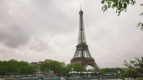 View of the Eiffel Tower from the right bank of the Seine River. Stock Footage 310178389