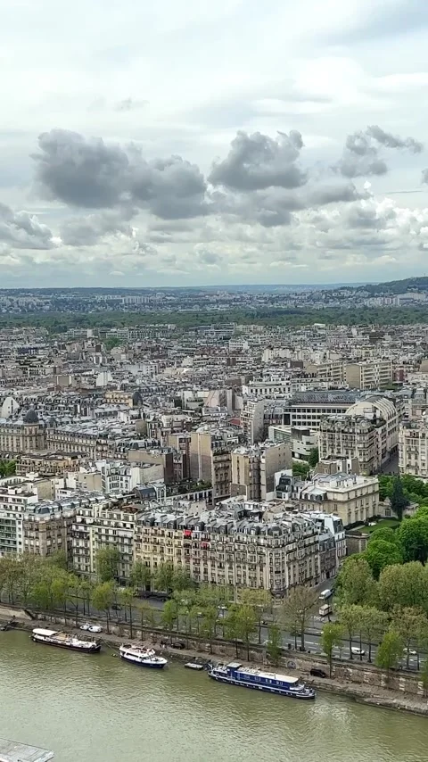 View from the Eiffel Tower on the snow-white buildings of Paris visible river Stock Footage 244254309