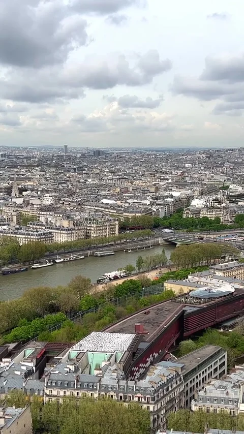 View from the Eiffel Tower on the snow-white buildings of Paris visible river Stock Footage 244254990