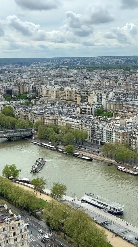 View from the Eiffel Tower on the snow-white buildings of Paris visible river Stock Footage 244256013