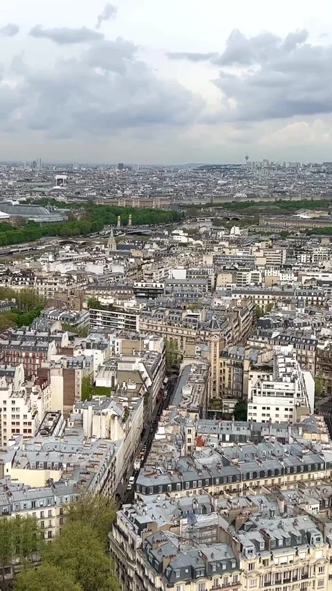 View from the Eiffel Tower on the snow-white buildings of Paris visible river Stock Footage 244256912