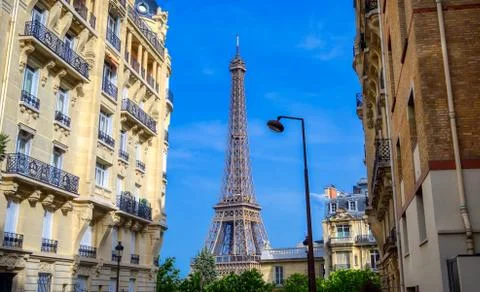 A view of the Eiffel Tower from the streets of Paris, France. Stock Photos