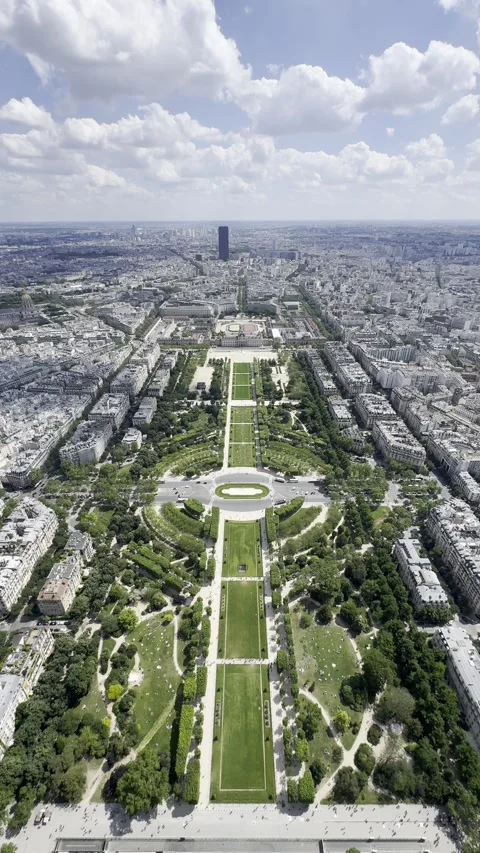 View from Eiffel Tower summit overlooking Champ de Mars in Paris, France 動画素材 337196798