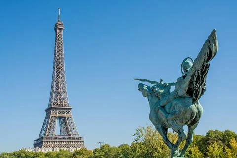 View of the Eiffel tower walking through Paris view of the Eiffel tower wa... Stock Photos