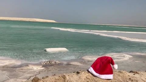View Ein Bokek resort on the Dead Sea in Israel. Santa hat Stock Footage 220681066