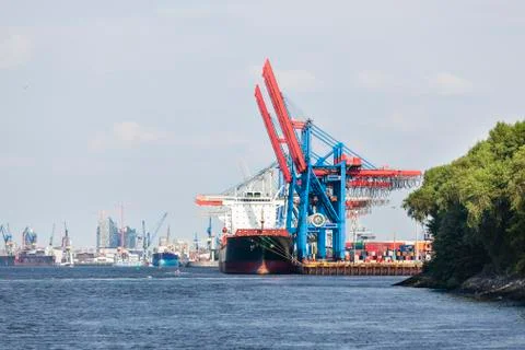 View from the Elbe in Hamburg, Germany to a container terminal of the harbor, Stock Photos