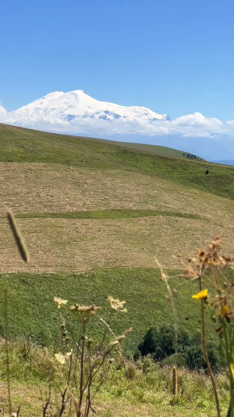 View of Elbrus from the Gumbashi pass, the highest mountain pass in Russia. Stock Footage 287544410