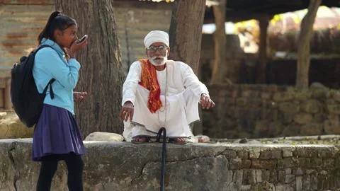 View of an elderly man and a young woman in Dhangadhi, Nepal. Video stock 335476158