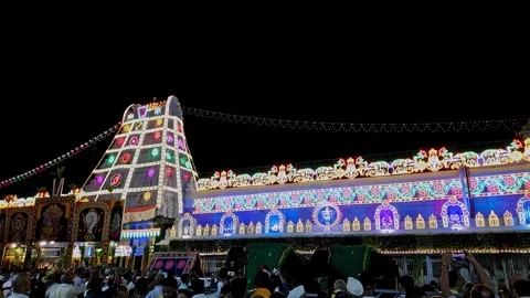 A view of elephants and crowds of devotees at the famous Tirupati Balaji Temp Video stock 252508728