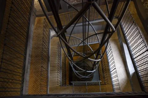 View of elevator shaft and staircase in the Astronomical Clock Tower in Pragu Stock Photos