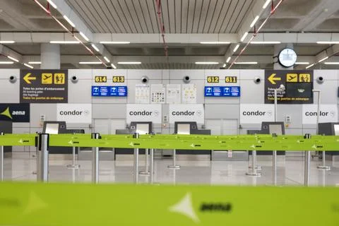 View on empty Aena check in queues and stanchion belt at Palma de Mallorca .. Stock Photos