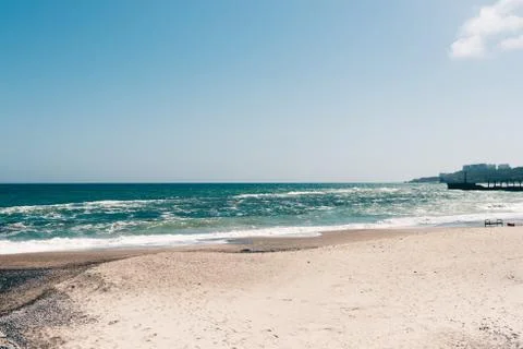 View of an empty beach on a sunny day Stock Photos