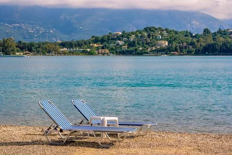 View of empty beach on sunset Stock Photos