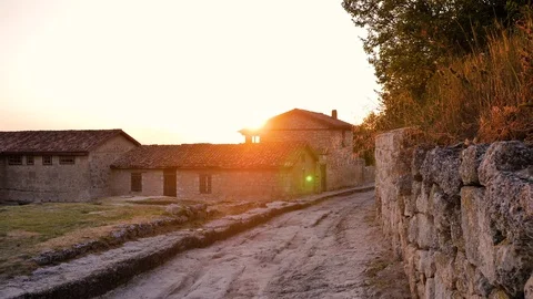 View of empty beautiful street with old traditional houses. stone and tile house Stock Footage 126710691