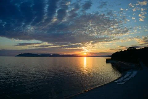 View of empty Black sea beach and sky sunset Stock Photos