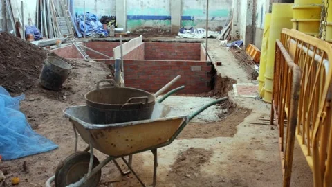 View of empty building site with brick construction, tools and materials Vídeos de archivo 131283423