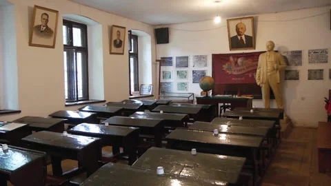 View Of An Empty Classroom Interior With Wooden Desks In Old Soviet-Era School Stock Footage 219235486