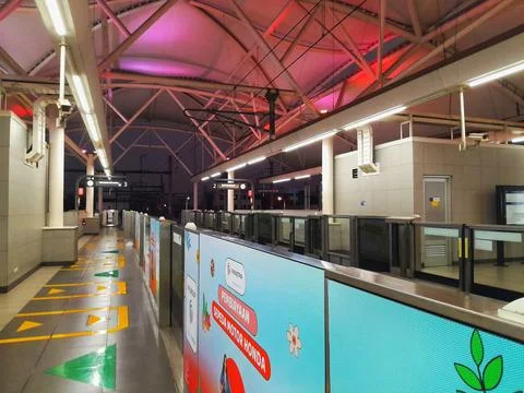 View of an empty corridor of Jakarta MRT station at night. Stock Photos
