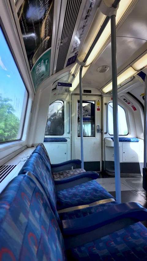 View of an empty Jubilee Line train carriage in London, showcasing clean Stock Footage 337875091