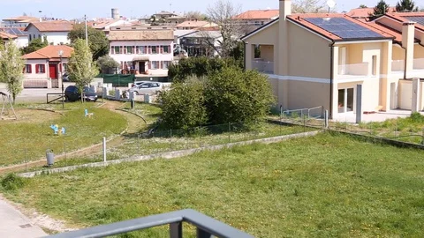 View of an empty neighborhood housing without any people on a sunny day Video stock 127979250