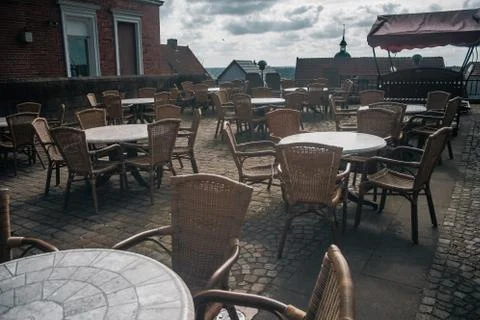 View of empty outdoor cafe in Bad Bentheim, Germany, with cozy decorations Stock Photos