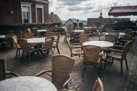View of empty outdoor cafe in Bad Bentheim, Germany, with cozy decorations Stock Photos