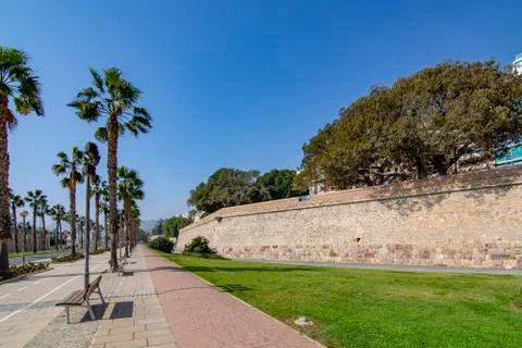 View to empty palm lined promenade of ancient fortification of Cartagena, Spa Stock Photos