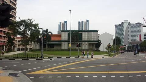 View of empty road at traffic light at Singapore with background of modern bu Stock Photos