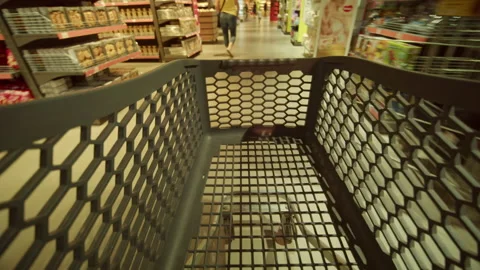 The view of an empty shopping cart. Timelapse of shopping at the supermarket Stock Footage 205196408