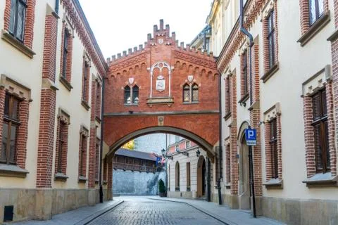 View of empty street without people of old city in Krakow, Pijarska at dawn.  Stock Photos