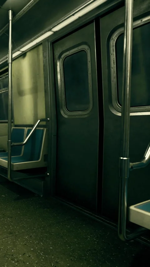 View of empty subway train interior with seats and doors during a quiet moment Stock Footage 334724826