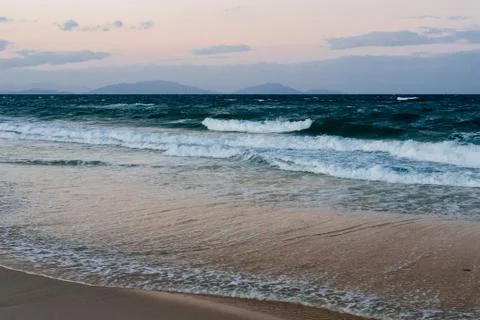View of an empty tropical beach at sunset Stock Photos