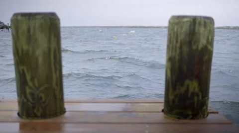View From End Of A Dock Looking Out At Stormy Sea Video stock 61174881