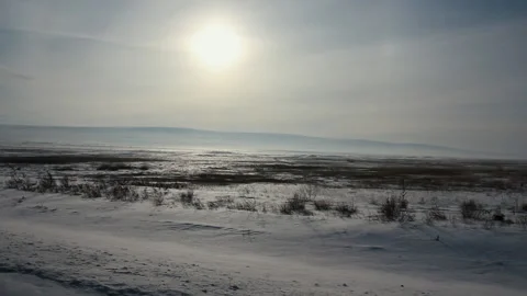 View of Endless Northern Plain from Window of Riding Car. Clear sky. Sun Sletip Video stock 146877074