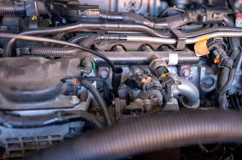 View of the engine compartment of the vehicle during vehicle maintenance Stock Photos