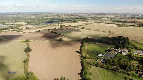 View of English fields with shadows of clouds passing over Stock Footage 102861757