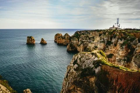 View of eroded sea stacks and limestone cliffs Stock Photos